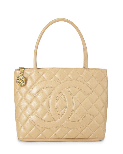 CHANEL BEIGE QUILTED CAVIAR...